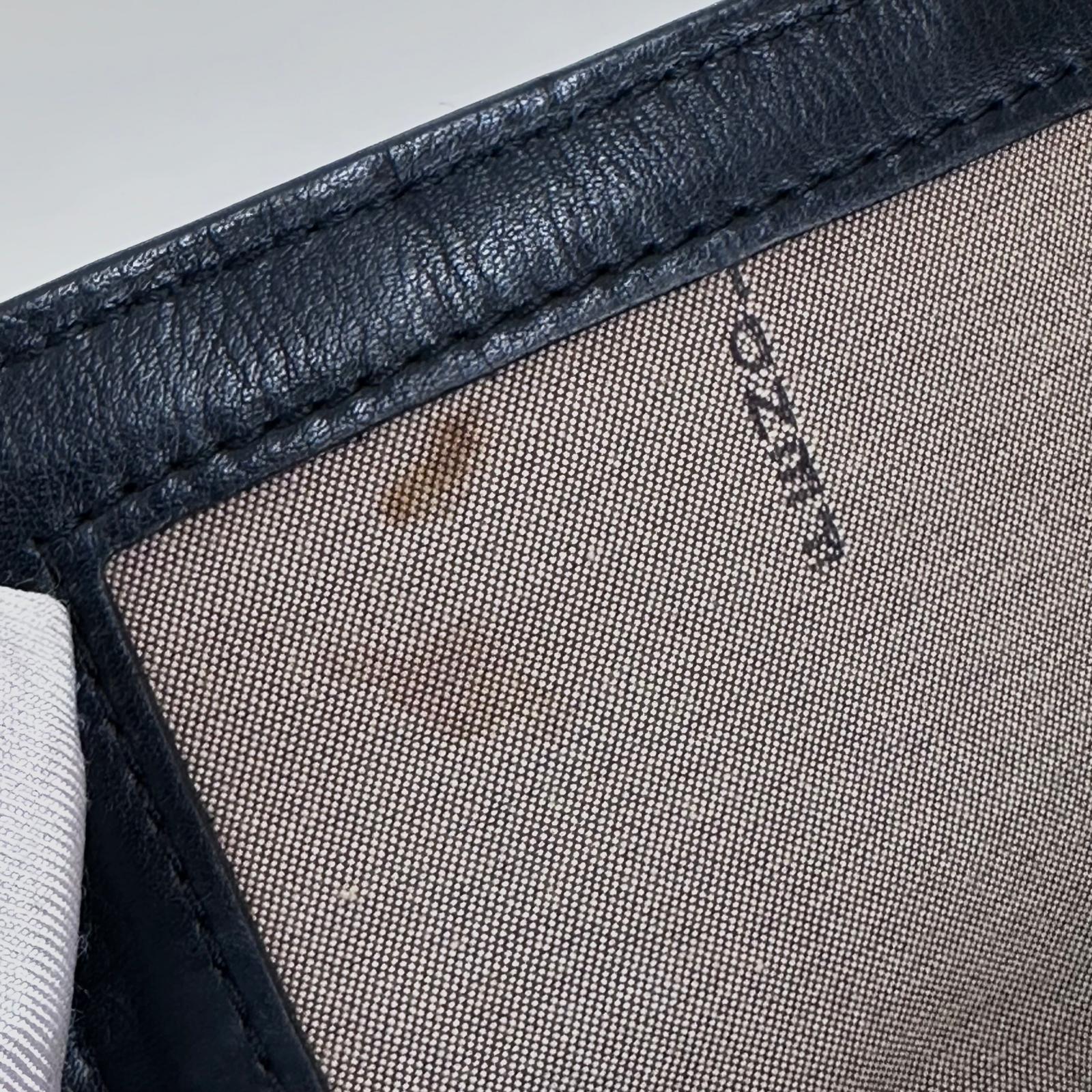 Fendi Baguette a mano in tessuto FF con dettagli in pelle nera