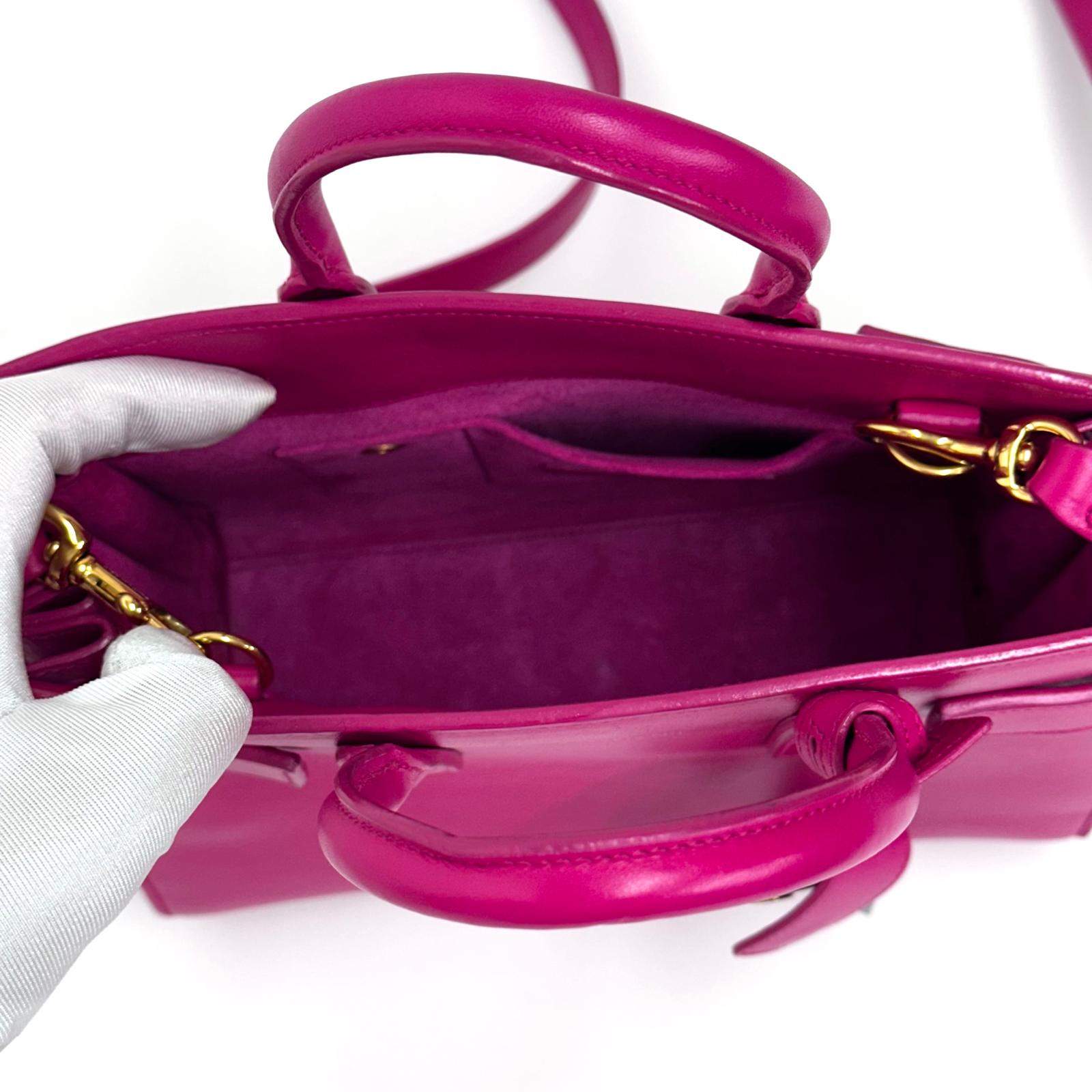 Saint Laurent Borsa Sac de Jour Nano in Pelle Fucsia