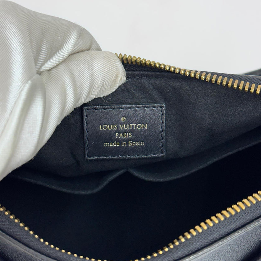 Borsa Louis Vuitton V Tote BB in pelle Monogram Empreinte nera