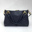 Borsa Louis Vuitton V Tote BB in pelle Monogram Empreinte nera