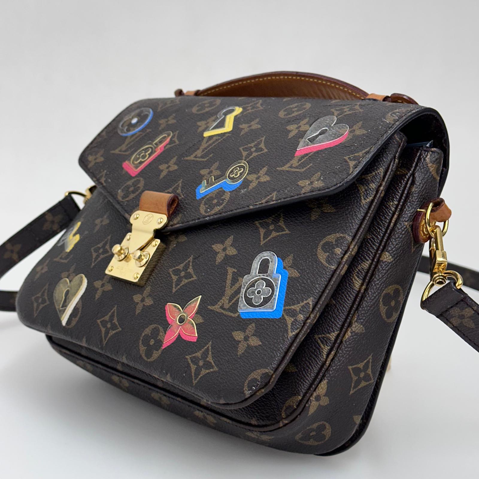 Borsa Louis Vuitton a tracolla Pochette Métis Monogram Stickers