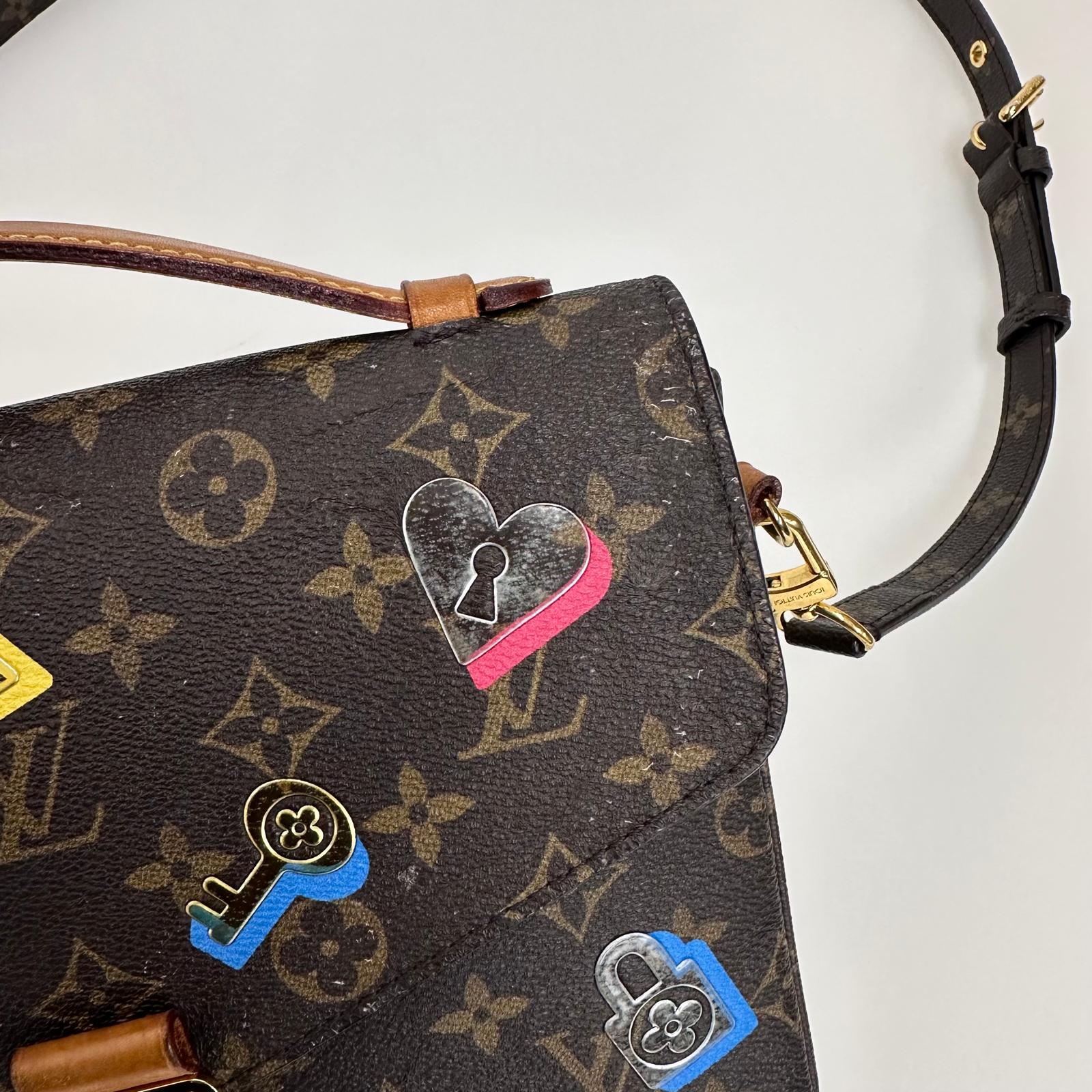 Borsa Louis Vuitton a tracolla Pochette Métis Monogram Stickers