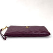 Borsa Pochette Saint Laurent Cassandre Wristlet in Pelle Matelassé Bordeaux