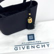 Borsa a mano Givenchy vintage in raso nero con pizzo e nappina gioiello