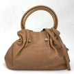 Bvlgari Borsa Twist in pelle martellata beige a due vie