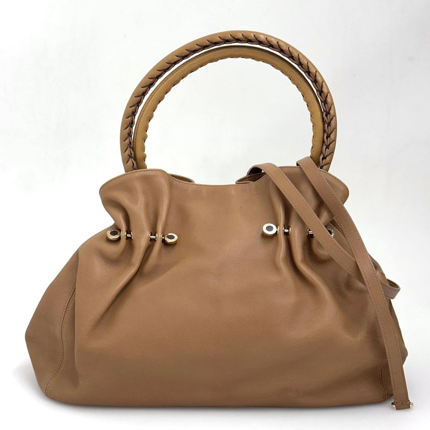 Bvlgari Borsa Twist in pelle martellata beige a due vie