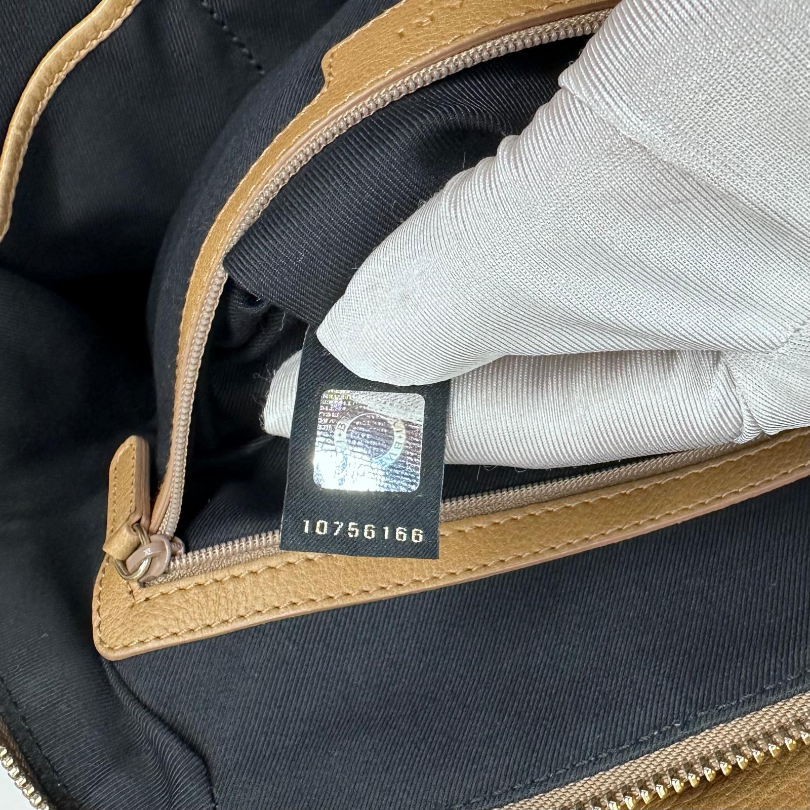 Bvlgari Borsa Twist in pelle martellata beige a due vie