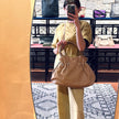 Bvlgari Borsa Twist in pelle martellata beige a due vie