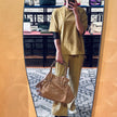 Bvlgari Borsa Twist in pelle martellata beige a due vie