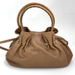 Bvlgari Borsa Twist in pelle martellata beige a due vie