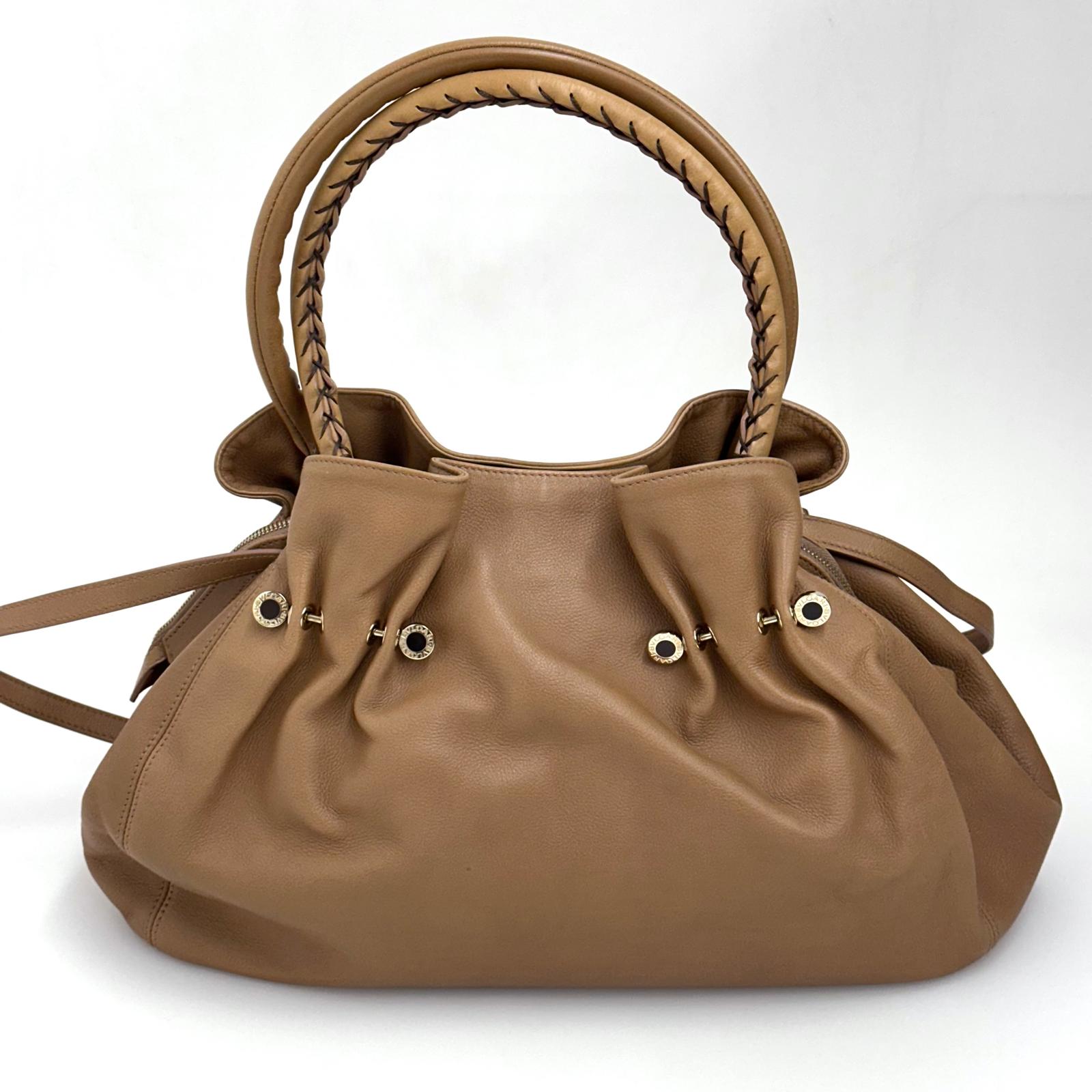 Bvlgari Borsa Twist in pelle martellata beige a due vie