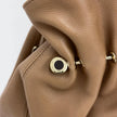 Bvlgari Borsa Twist in pelle martellata beige a due vie
