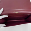 Cartier Borsa clutch in pelle bordeaux con logo centrale