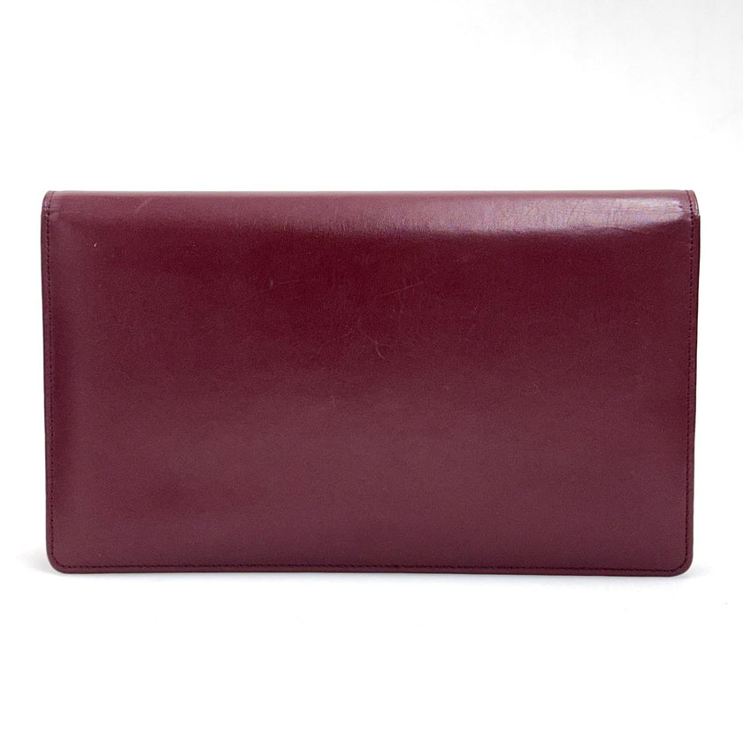 Cartier Borsa clutch in pelle bordeaux con logo centrale