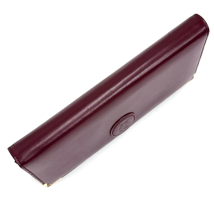Cartier Borsa clutch in pelle bordeaux con logo centrale