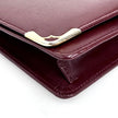 Cartier Borsa clutch in pelle bordeaux con logo centrale