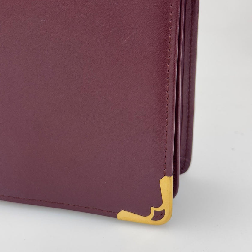 Cartier Pochette Vintage Bordeaux in Pelle