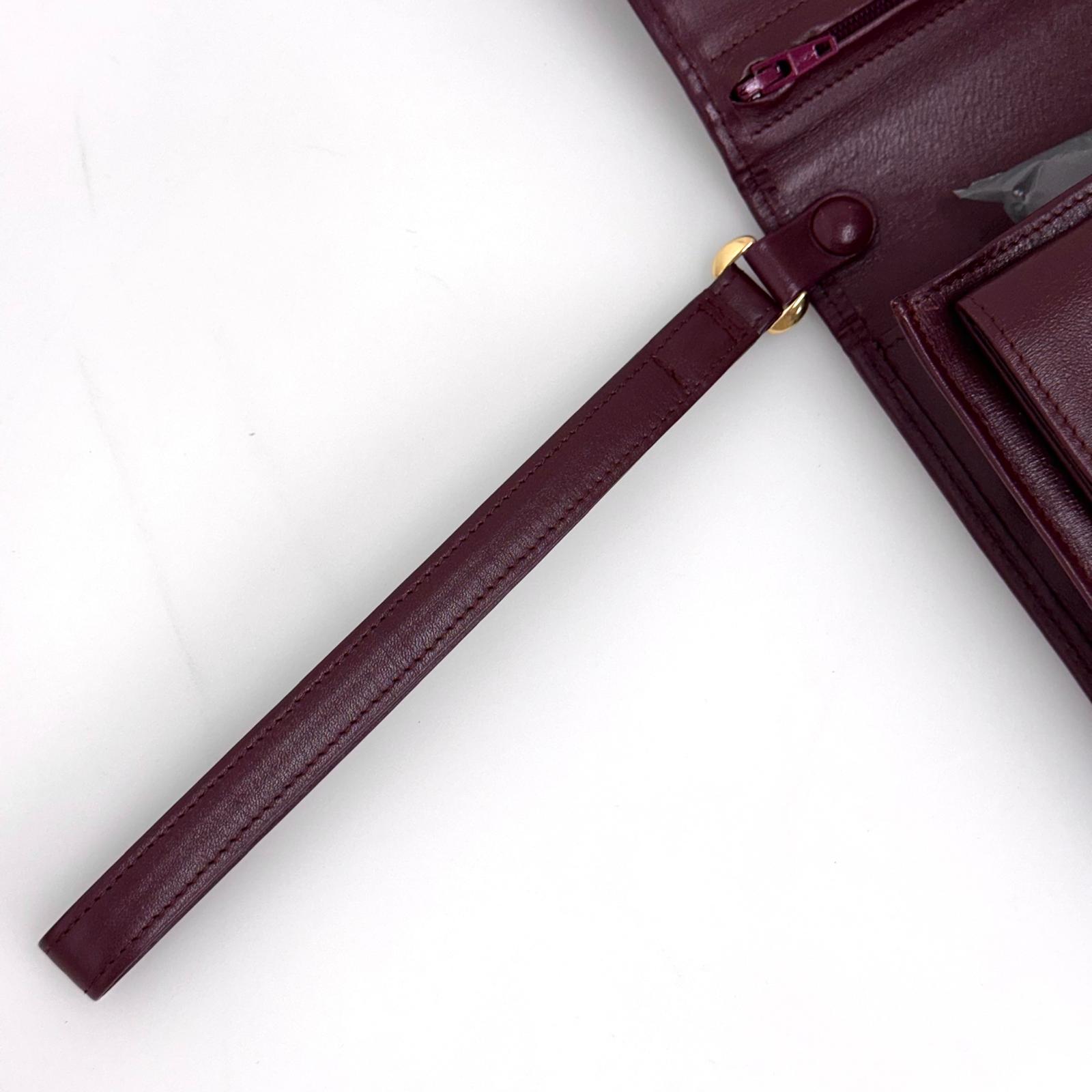 Cartier Pochette Vintage Bordeaux in Pelle
