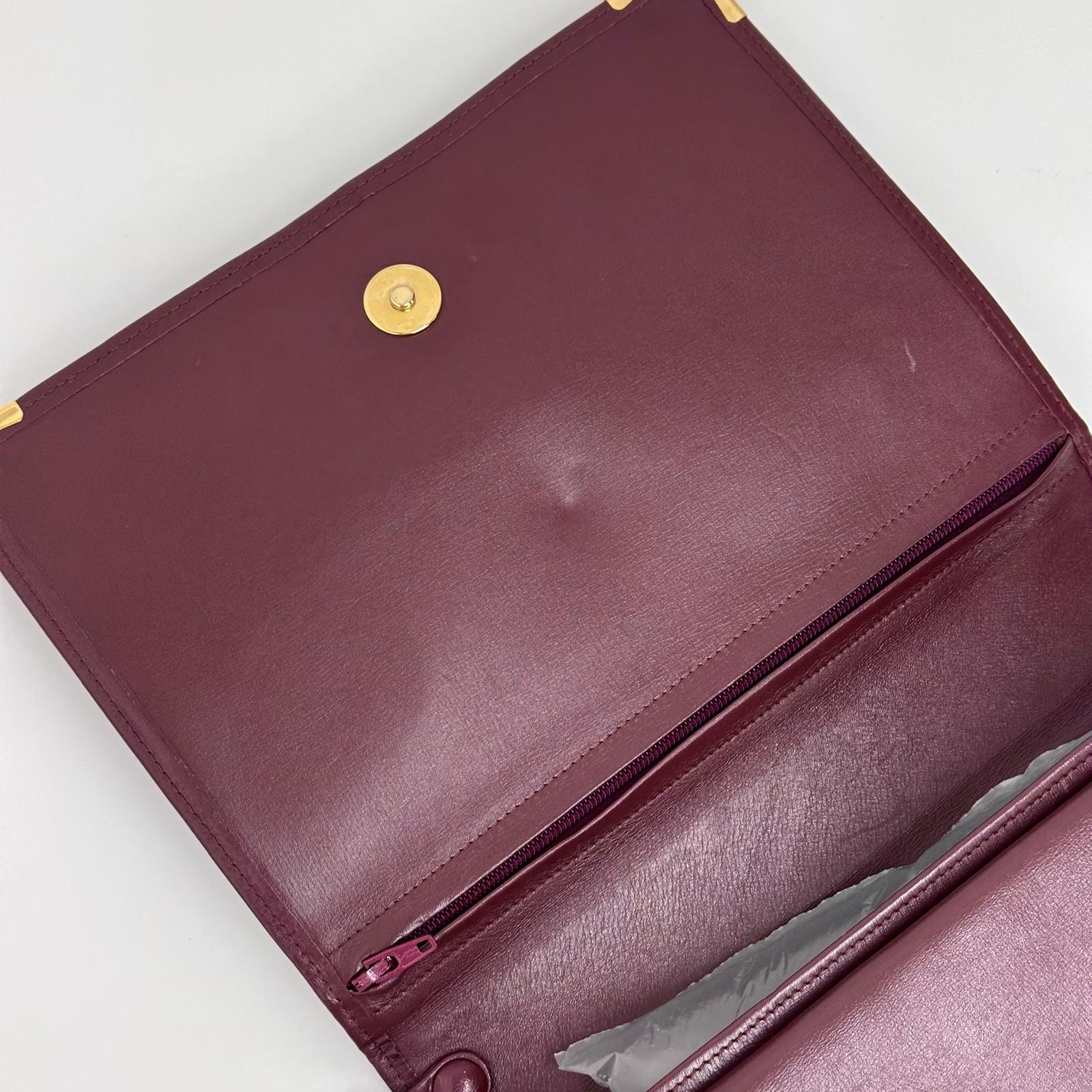 Cartier Pochette Vintage Bordeaux in Pelle