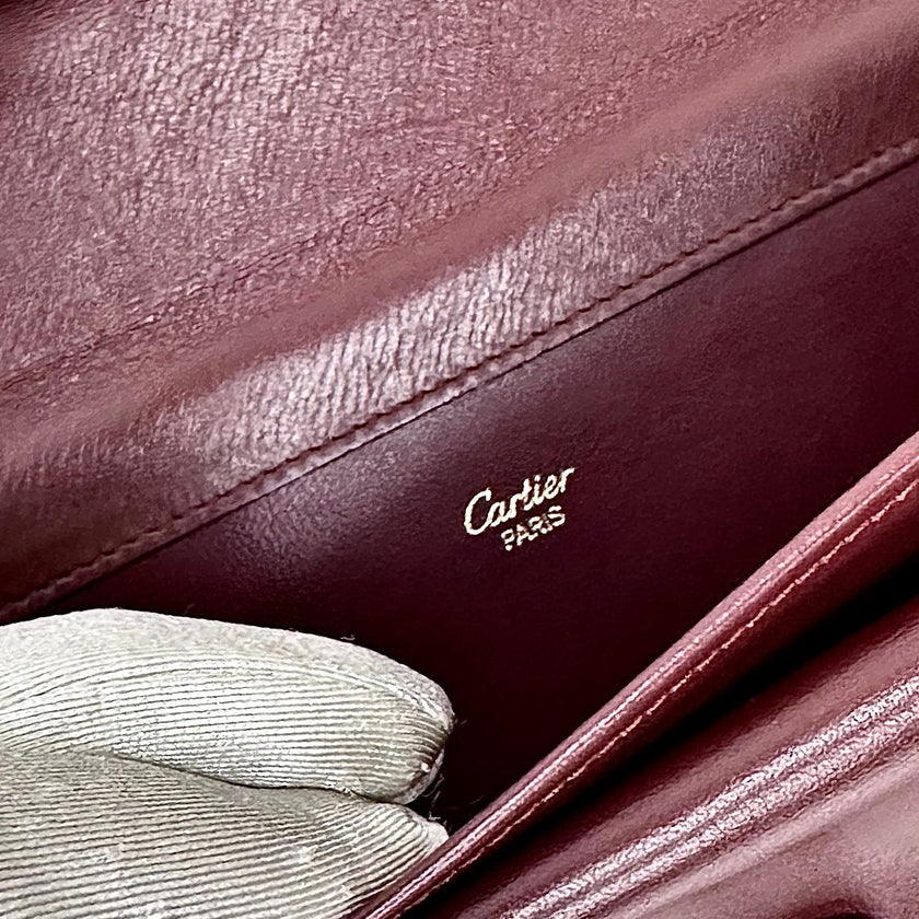 Cartier Pochette Vintage Bordeaux in Pelle