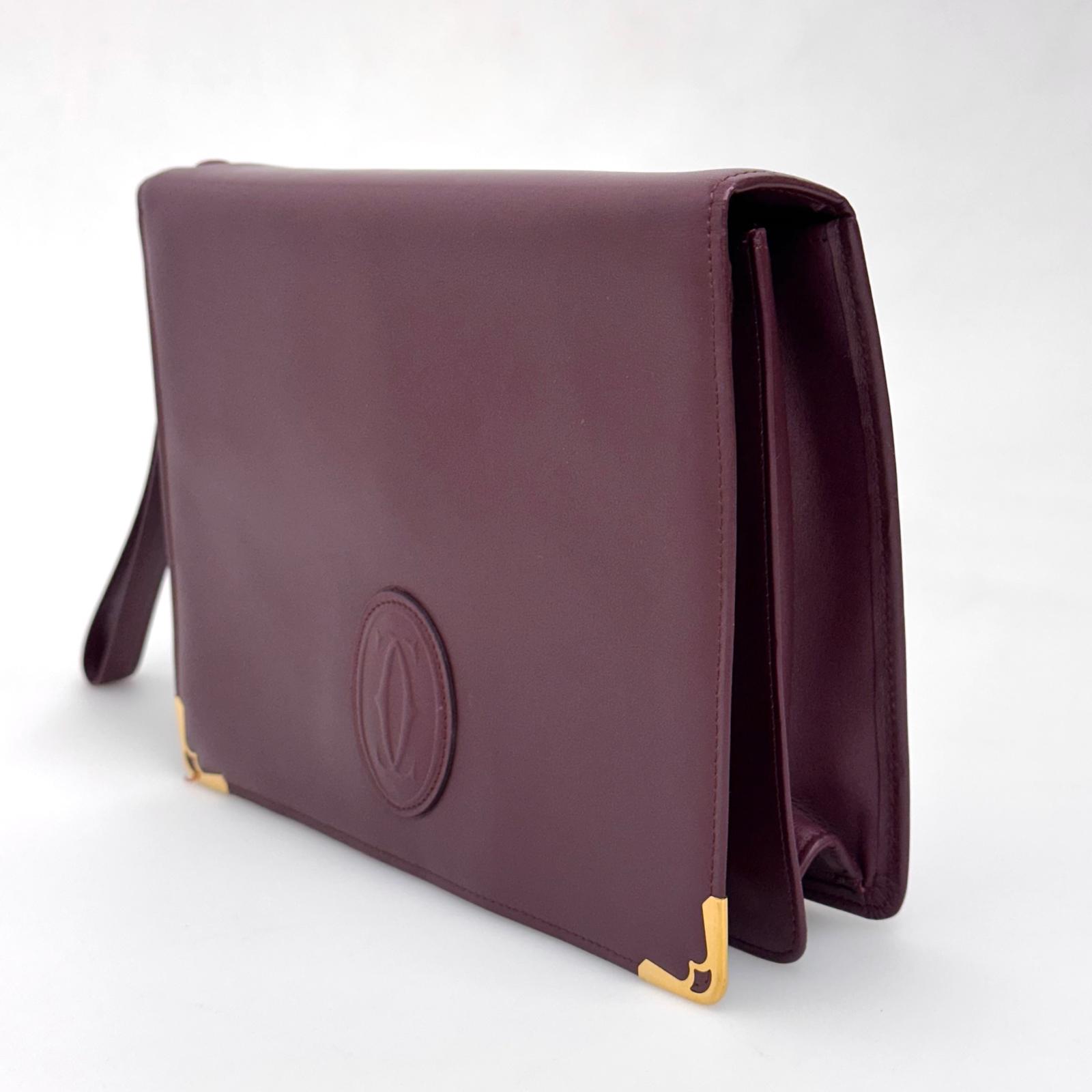 Cartier Pochette Vintage Bordeaux in Pelle