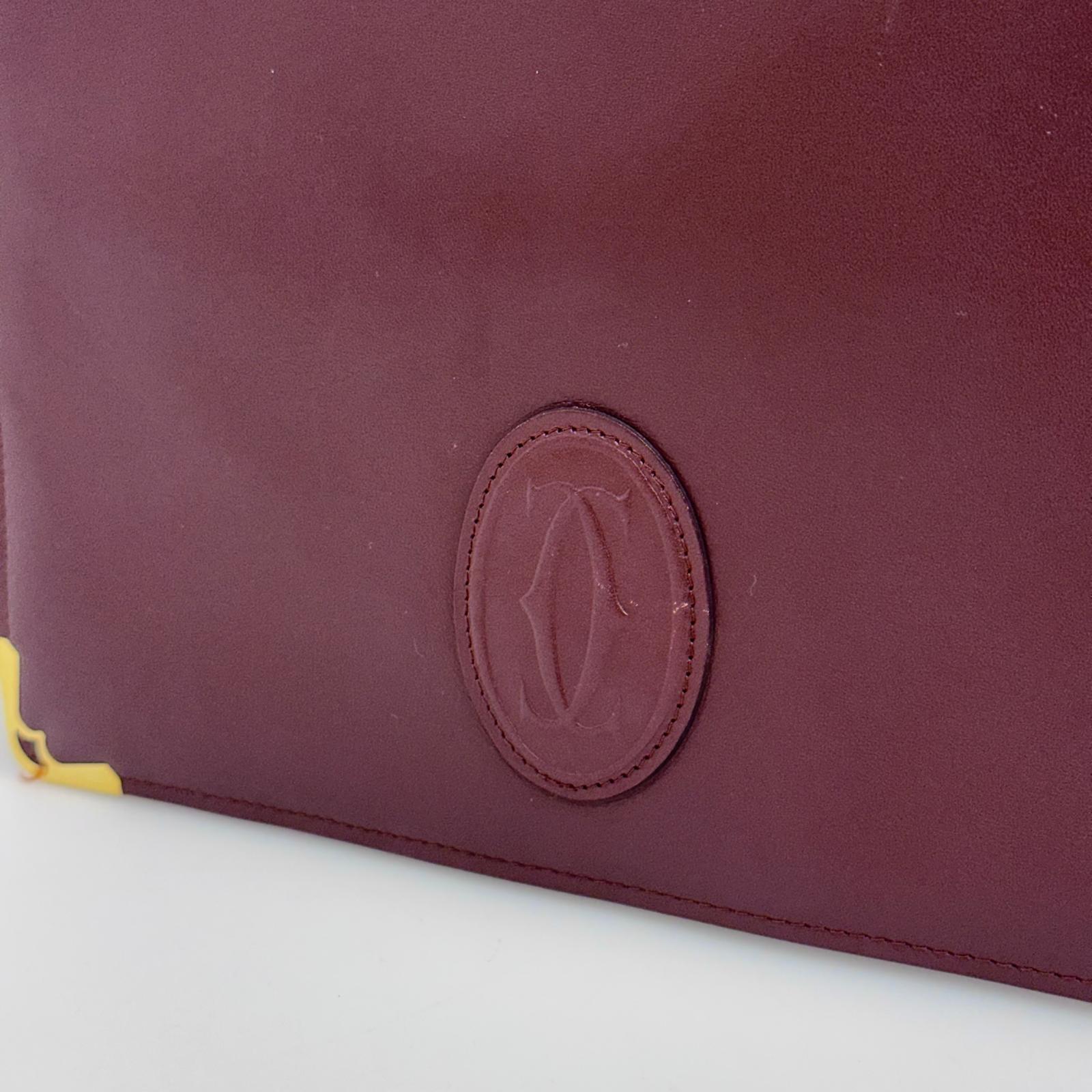 Cartier Pochette Vintage Bordeaux in Pelle
