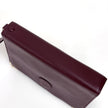 Cartier Pochette Vintage Bordeaux in Pelle