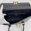 Céline Borsa a mano in pelle nera vintage con chiusura bijoux oro