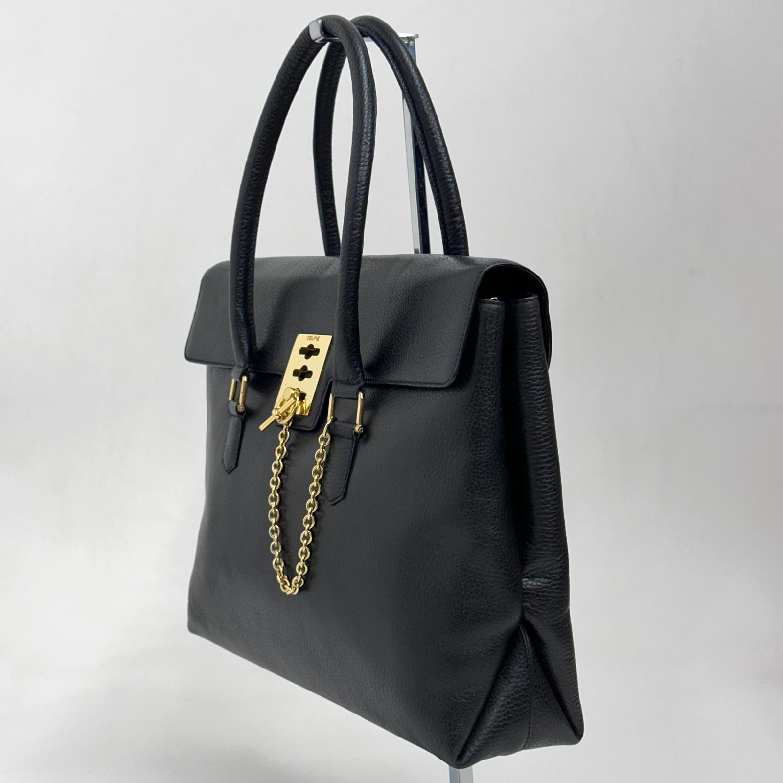 Céline Borsa a mano in pelle nera vintage con chiusura bijoux oro