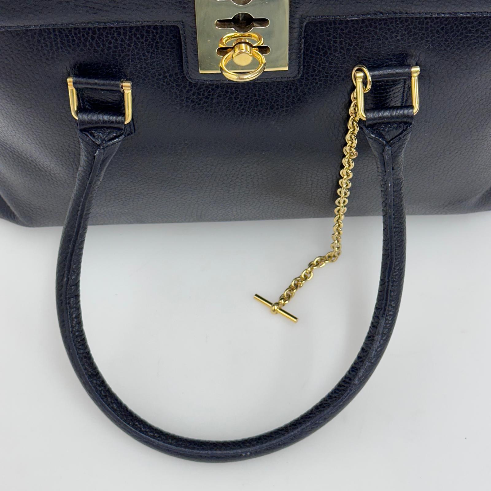 Céline Borsa a mano in pelle nera vintage con chiusura bijoux oro