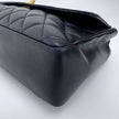 Chanel Borsa Classic Flap 25 in Pelle Nera con Finiture in Oro 24k