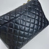 Chanel Borsa Classic Flap 25 in Pelle Nera con Finiture in Oro 24k