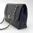 Chanel Borsa Timeless Classic Double Flap Limited Paris Vintage in pelle nera