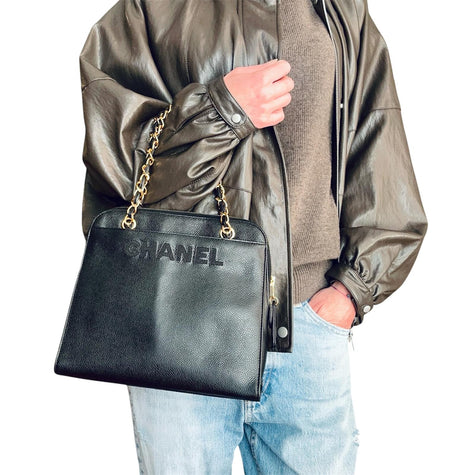 Chanel Borsa a mano in pelle caviar nera con logo frontale in pelle Caviar e oro