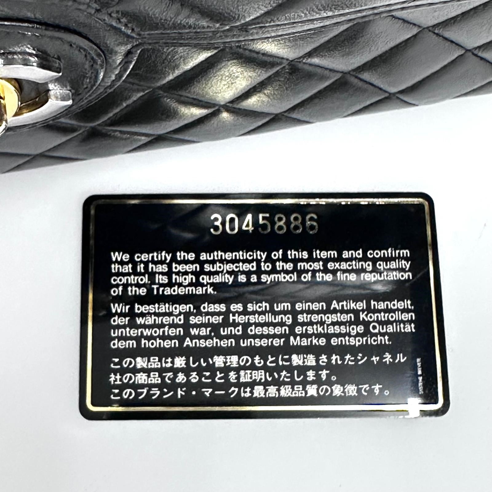 Chanel borsa Classic Single Flap 25 Paris limited in pelle di agnello nera