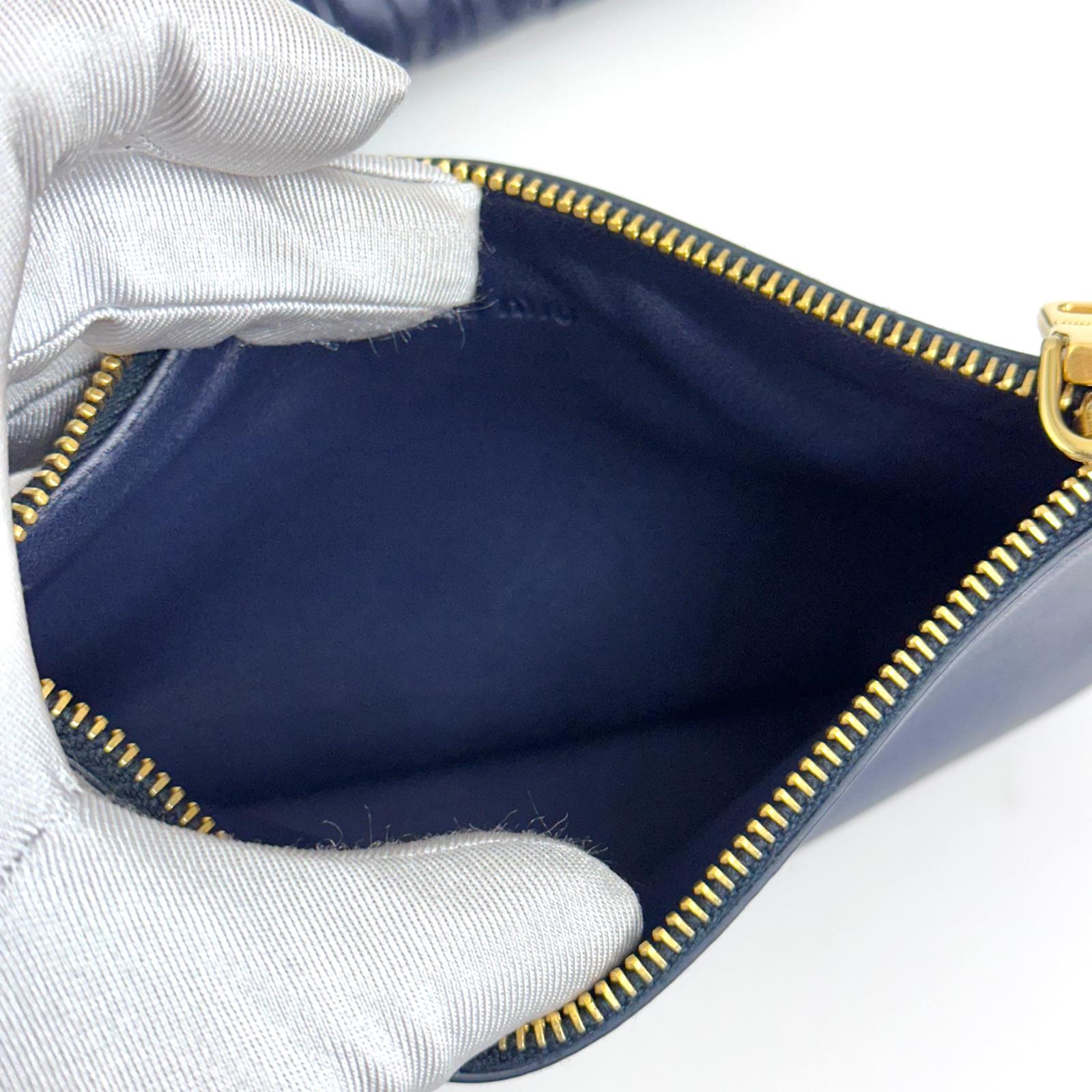 Clutch Miu Miu in pelle blu Matelassé con pochette removibili