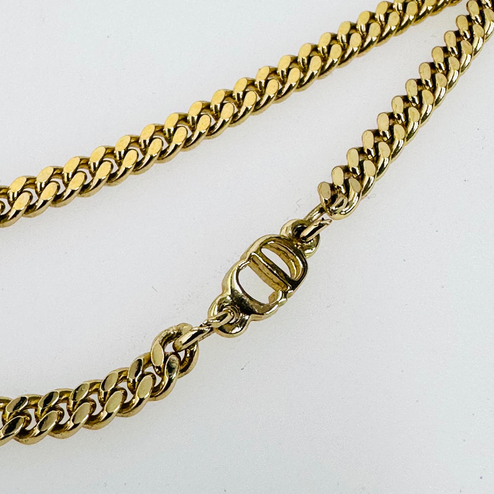 Collana Dior in metallo dorato maglia groumette con iniziali GP