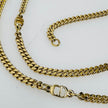 Collana Dior in metallo dorato maglia groumette con iniziali GP