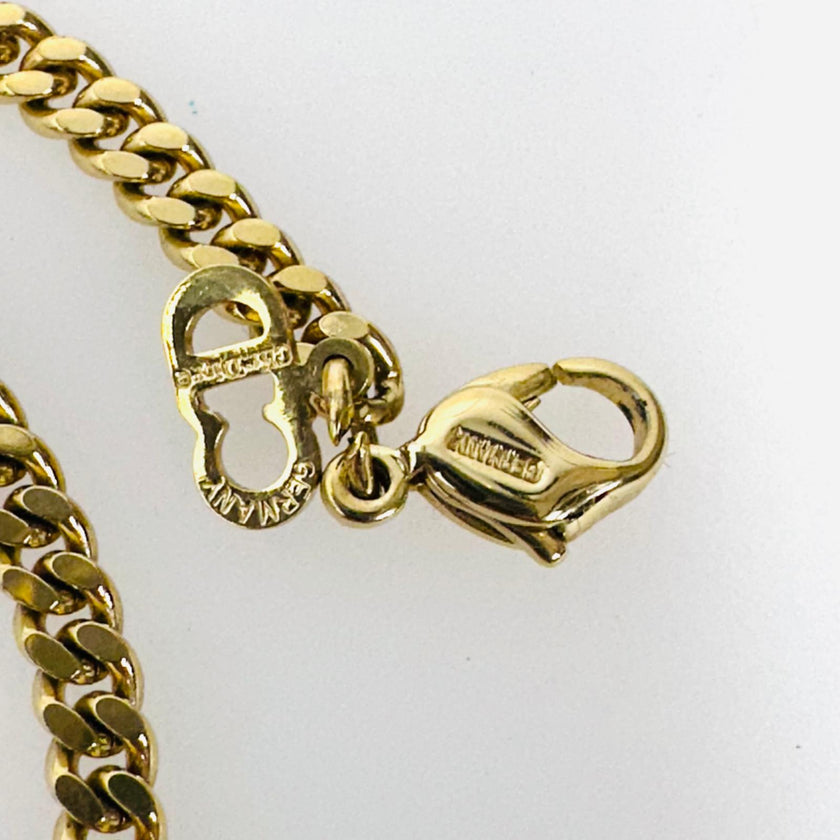 Collana Dior in metallo dorato maglia groumette con iniziali GP