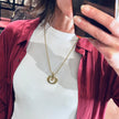 Collana Lady Dior dorata con pendente logo