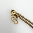 Collana Lady Dior dorata con pendente logo