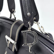 Dior Gaucho Bowling Bag in pelle nera con fibbia e charm CD