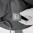 Fendi Borsa a spalla Baguette in jersey nero con logo FF in metallo