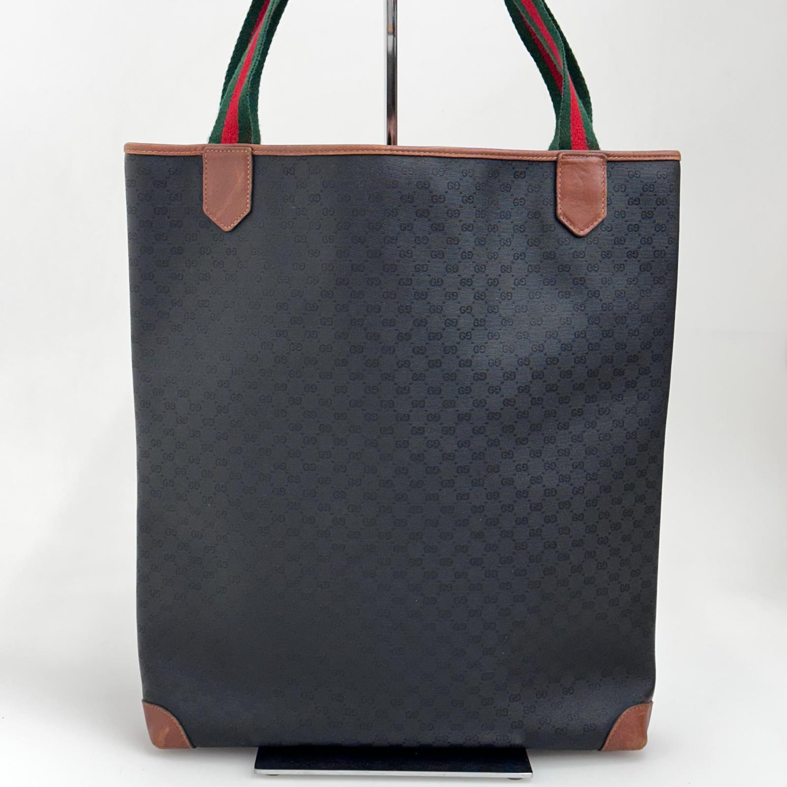 Gucci Borsa Web vintage a spalla in tela Micro GG nera e pelle marrone