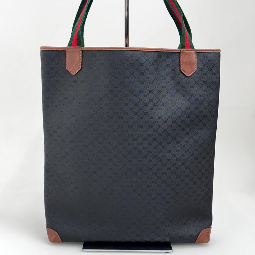 Gucci Borsa Web vintage a spalla in tela Micro GG nera e pelle marrone