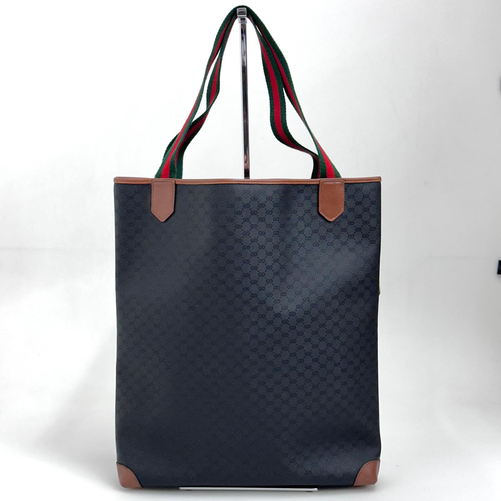 Gucci Borsa Web vintage a spalla in tela Micro GG nera e pelle marrone
