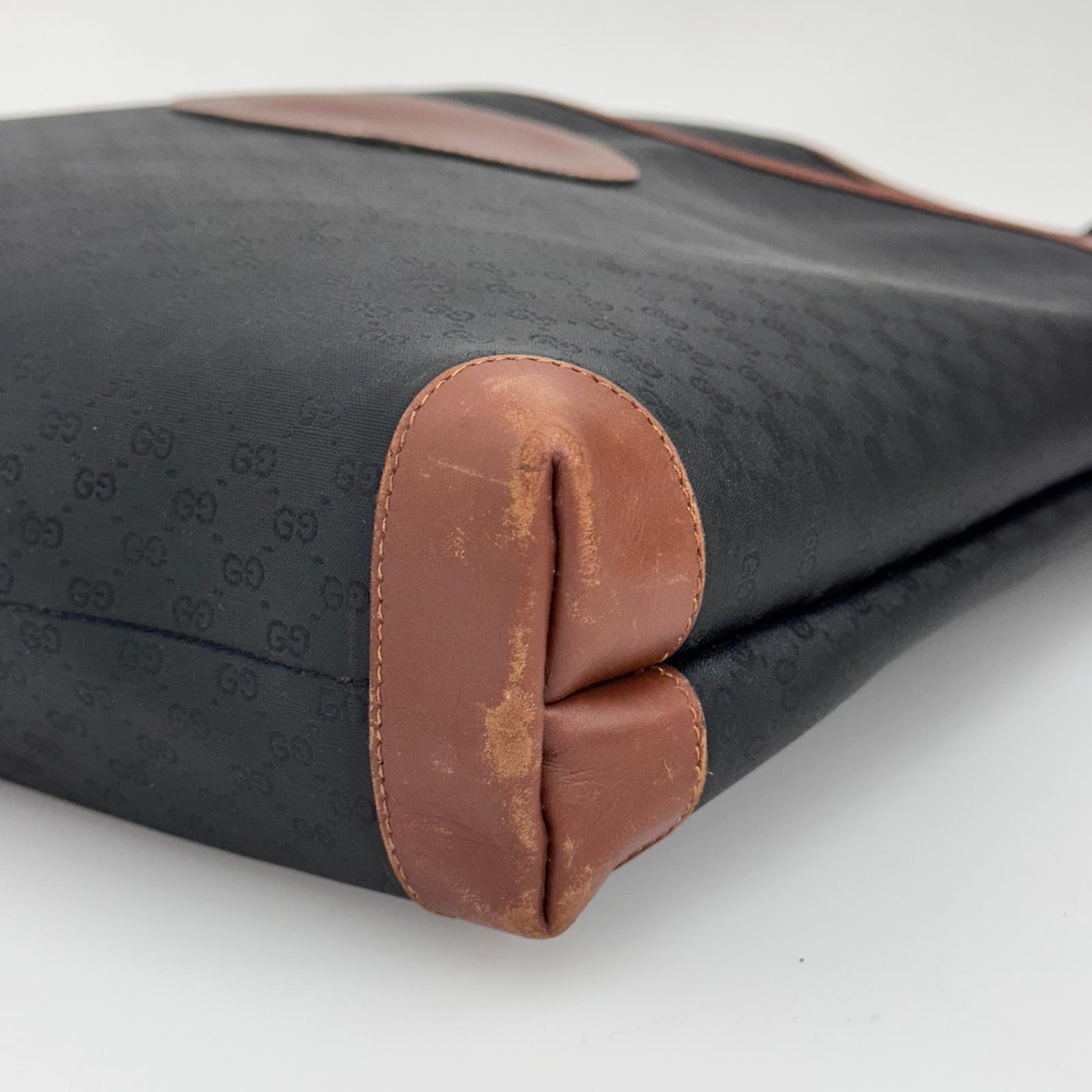 Gucci Borsa Web vintage a spalla in tela Micro GG nera e pelle marrone