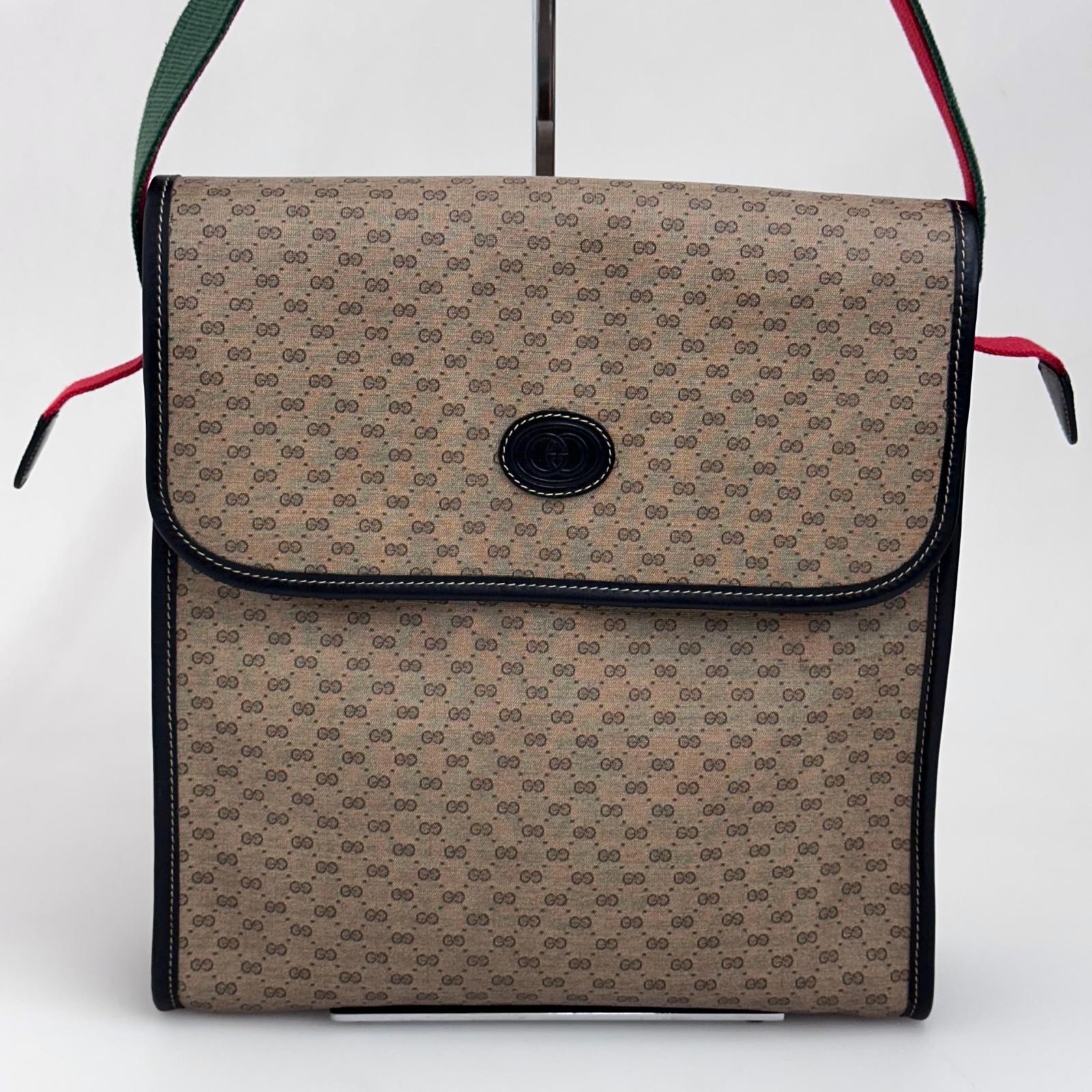 Gucci Borsa a spalla Monogram GG Plus con Web Stripe