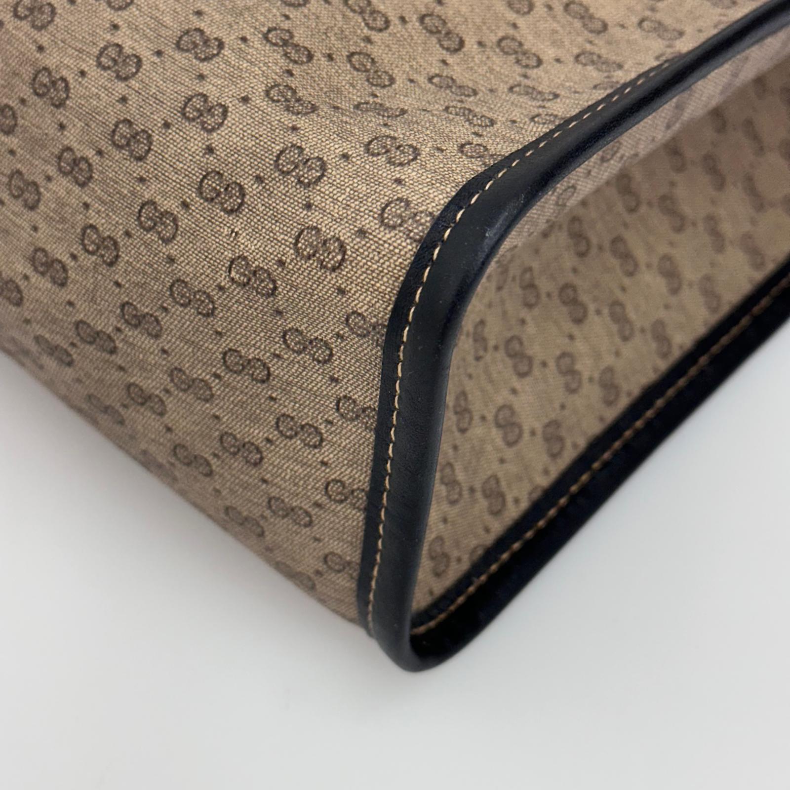 Gucci Borsa a spalla Monogram GG Plus con Web Stripe