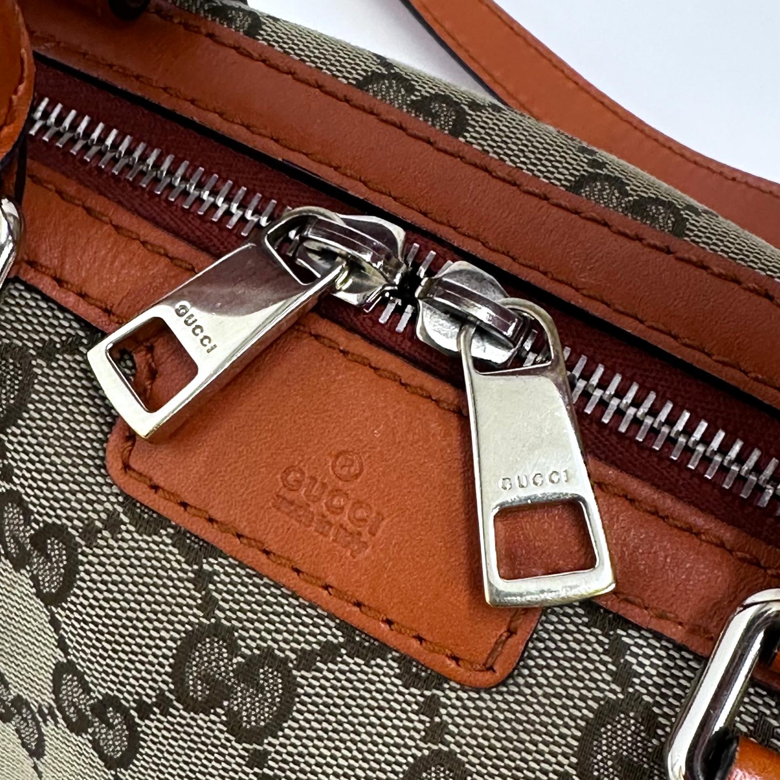 Gucci Boston Bag in tela GG Supreme con Dettagli in Pelle Arancio